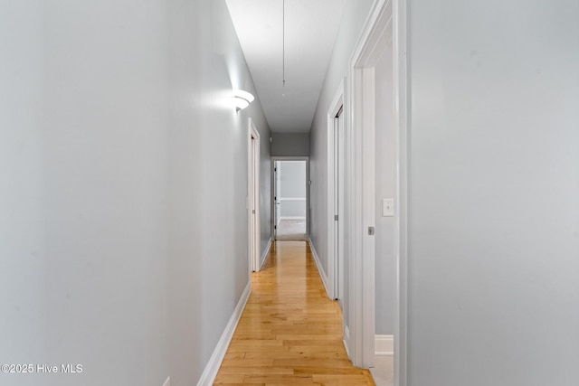 183 Baker Cir W, End, NC 27376 - hall featuring attic access and light wood-style floors