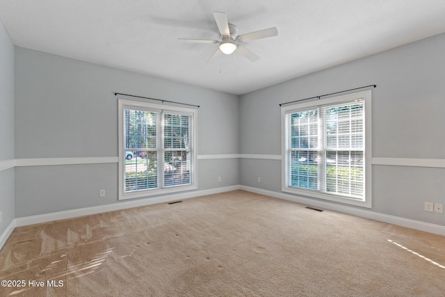 183 Baker Cir W, End, NC 27376 - carpeted spare room featuring plenty of natural light and a ceiling fan