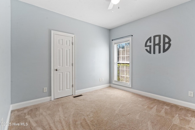 183 Baker Cir W, End, NC 27376 - carpeted empty room with ceiling fan and baseboards
