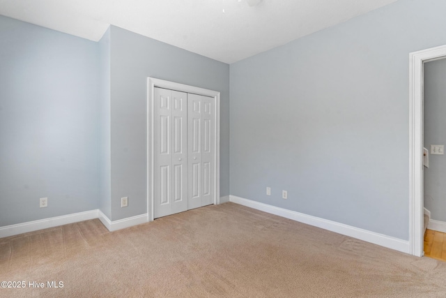 183 Baker Cir W, End, NC 27376 - unfurnished bedroom with carpet and a closet