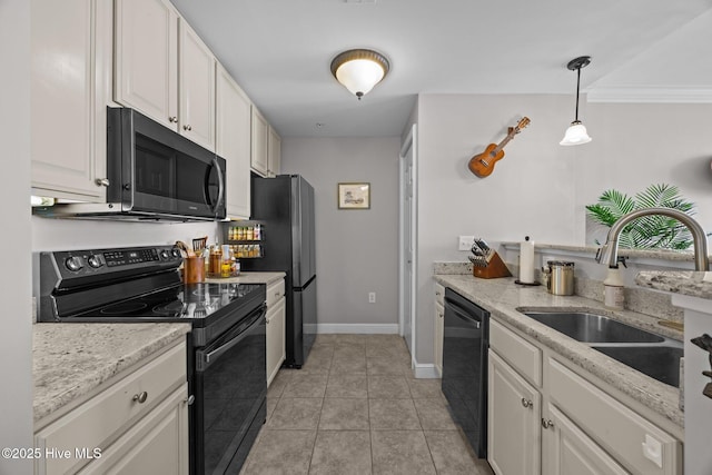 219 Sky Sail Blvd, New Bern, NC 28560 - kitchen featuring black appliances, white cabinets, light tile patterned floors, decorative light fixtures, and light stone counters