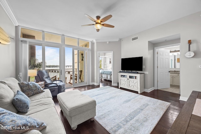 219 Sky Sail Blvd, New Bern, NC 28560 - living area with a ceiling fan, ornamental molding, and dark wood-style flooring