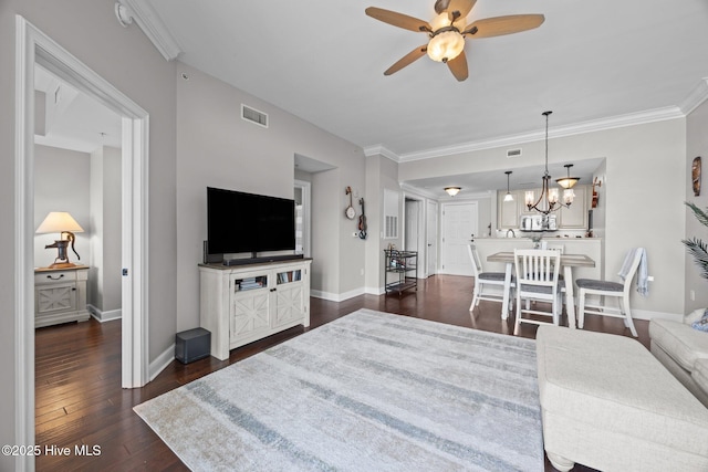 219 Sky Sail Blvd, New Bern, NC 28560 - living room with a ceiling fan, dark wood-style floors, a chandelier, and ornamental molding