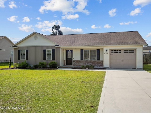 404 Bristol Ln, Hubert, NC 28539 - ranch-style home featuring an attached garage, driveway, and roof with shingles