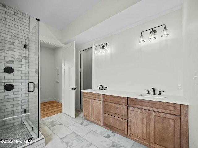 202 Topsail Watch Dr, Hampstead, NC 28443 - bathroom with marble look tile flooring, a stall shower, and double vanity