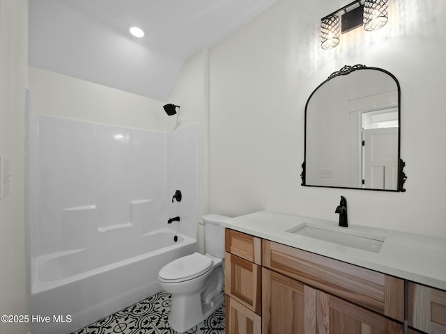 202 Topsail Watch Dr, Hampstead, NC 28443 - full bathroom with vanity, tub / shower combination, tile patterned flooring, and vaulted ceiling