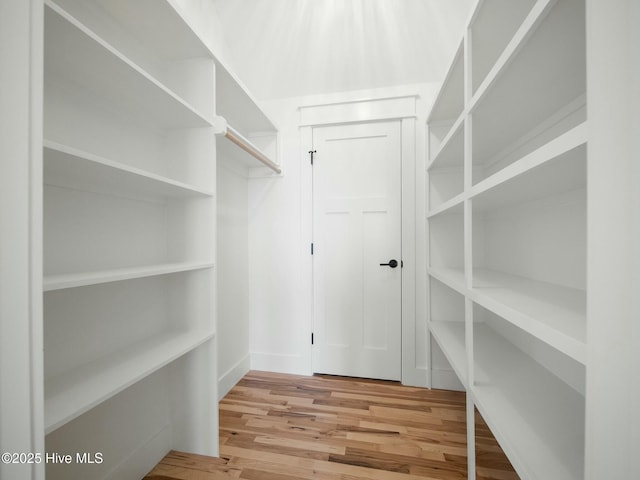 202 Topsail Watch Dr, Hampstead, NC 28443 - spacious closet featuring wood finished floors