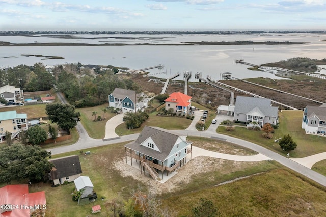 202 Topsail Watch Dr, Hampstead, NC 28443 - aerial perspective of suburban area featuring a large body of water
