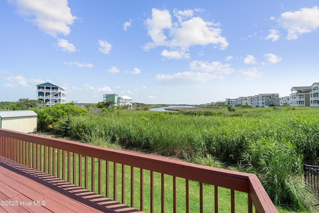9010 W 9th St, Surf City, NC 28445 - wooden terrace with a water view