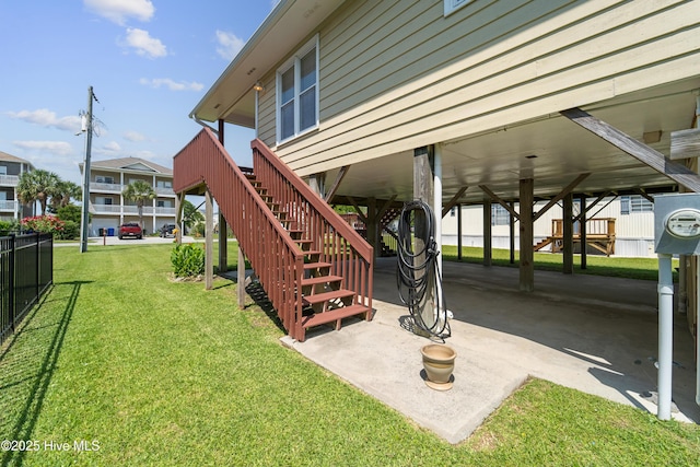 9010 W 9th St, Surf City, NC 28445 - view of yard with stairs and a carport