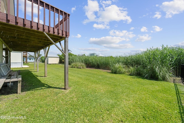 9010 W 9th St, Surf City, NC 28445 - view of grassy yard featuring a wooden deck