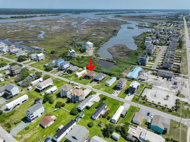 9010 W 9th St, Surf City, NC 28445 - aerial view of property and surrounding area featuring a nearby body of water and nearby suburban area