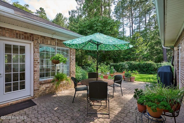 1 Pine Crest Dr, Whispering Pines, NC 28327 - view of patio / terrace featuring outdoor dining space and area for grilling