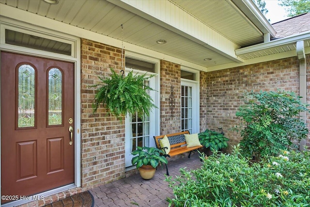 1 Pine Crest Dr, Whispering Pines, NC 28327 - entrance to property with brick siding and a porch