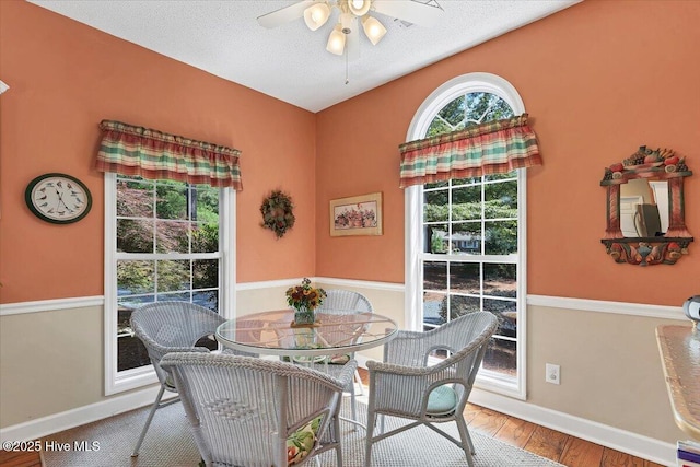 1 Pine Crest Dr, Whispering Pines, NC 28327 - dining room with ceiling fan, wood finished floors, and a textured ceiling