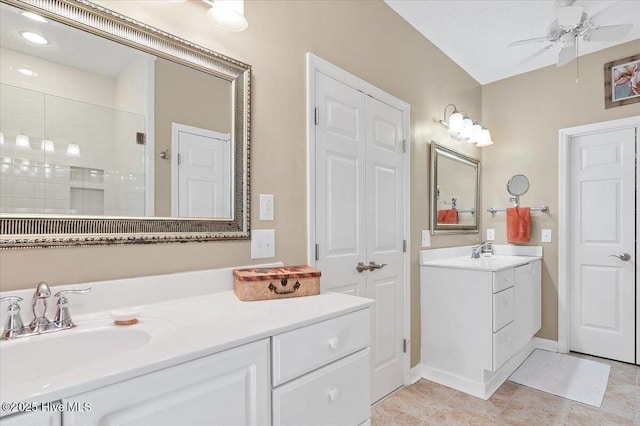 1 Pine Crest Dr, Whispering Pines, NC 28327 - full bath with vanity, a ceiling fan, a tile shower, and tile patterned flooring