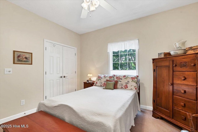 1 Pine Crest Dr, Whispering Pines, NC 28327 - bedroom with light colored carpet, a closet, and ceiling fan