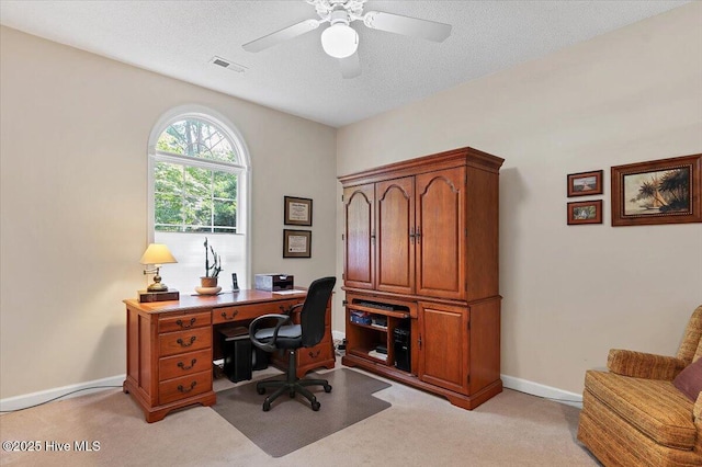 1 Pine Crest Dr, Whispering Pines, NC 28327 - office area with light carpet, a ceiling fan, and a textured ceiling