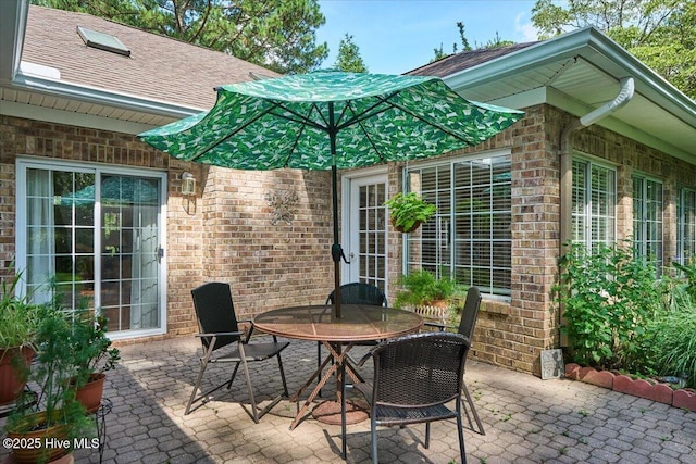 1 Pine Crest Dr, Whispering Pines, NC 28327 - view of patio featuring outdoor dining space