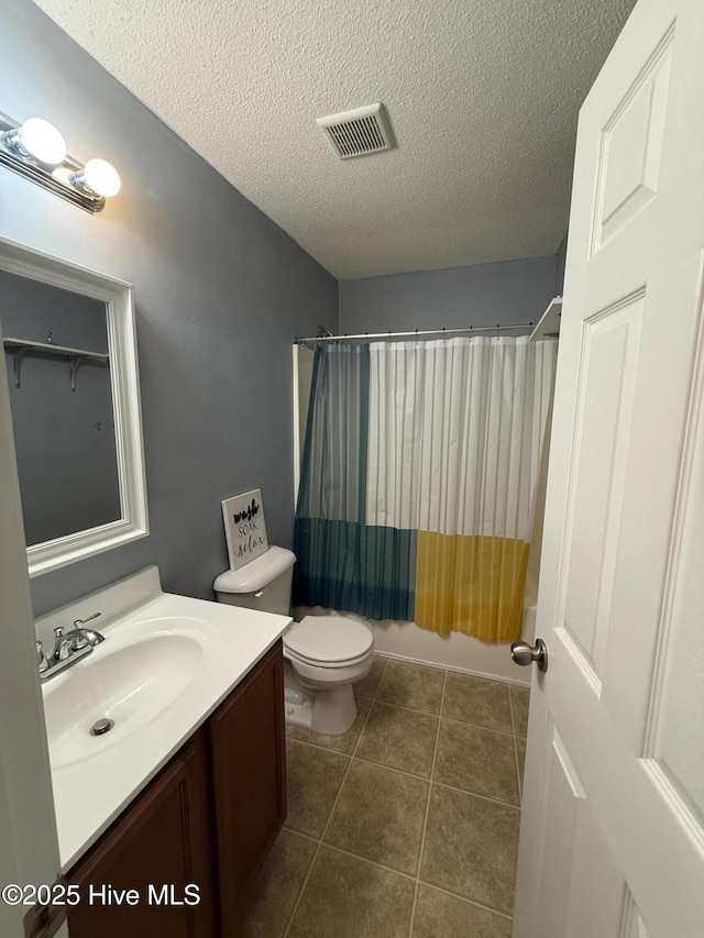 102 Harmony Way, Richlands, NC 28574 - bathroom with vanity, a textured ceiling, shower / bathtub combination with curtain, and tile patterned flooring