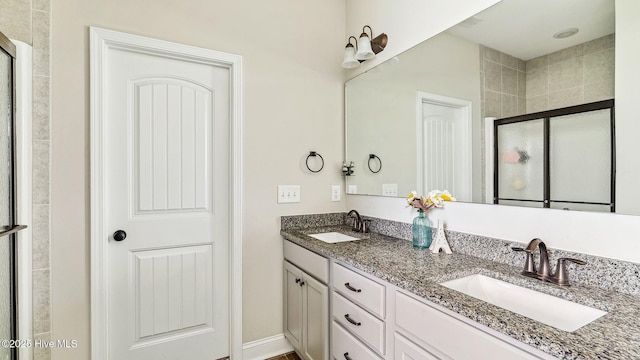75 Bynum Ct, Vass, NC 28394 - bathroom featuring a stall shower and double vanity