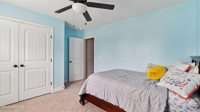75 Bynum Ct, Vass, NC 28394 - bedroom with light colored carpet, a closet, and a ceiling fan