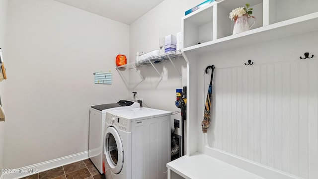 75 Bynum Ct, Vass, NC 28394 - laundry area featuring washing machine and clothes dryer and dark stone finish floors