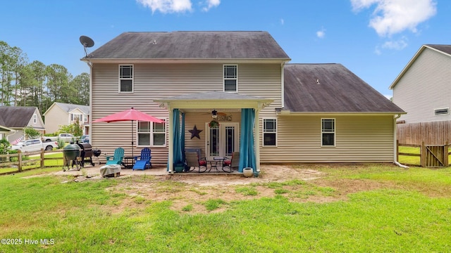 75 Bynum Ct, Vass, NC 28394 - rear view of house with a patio, ceiling fan, and roof with shingles