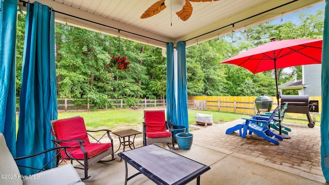 75 Bynum Ct, Vass, NC 28394 - fenced backyard featuring a patio area, ceiling fan, and area for grilling