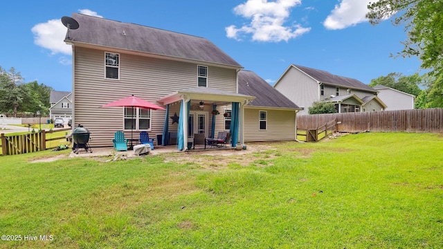 75 Bynum Ct, Vass, NC 28394 - rear view of house with ceiling fan, a patio, and a fenced backyard