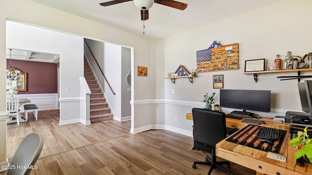 75 Bynum Ct, Vass, NC 28394 - office space with a ceiling fan, wood finished floors, and a chandelier