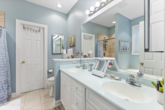 1178 Eastwood Landing Way, Sunset Beach, NC 28468 - bathroom with tiled shower, tile patterned floors, and double vanity