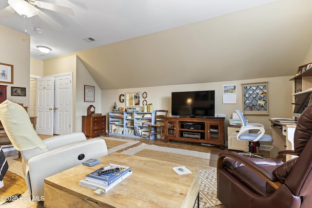 1178 Eastwood Landing Way, Sunset Beach, NC 28468 - living area with vaulted ceiling, ceiling fan, and wood finished floors