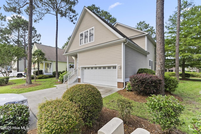1178 Eastwood Landing Way, Sunset Beach, NC 28468 - view of home's exterior featuring a garage and concrete driveway
