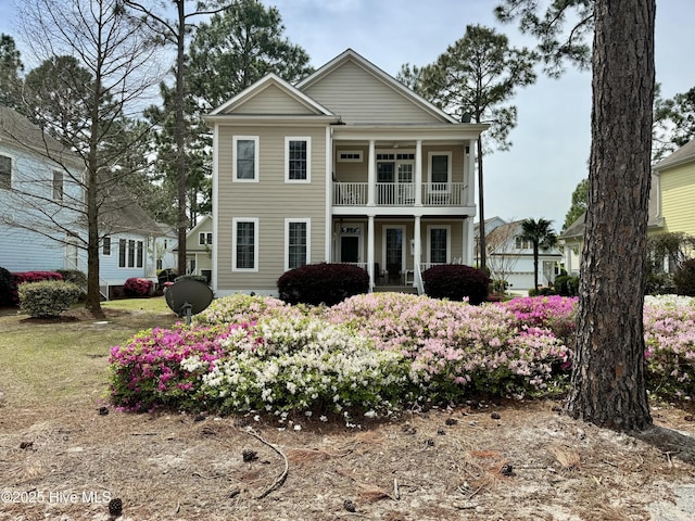 1178 Eastwood Landing Way, Sunset Beach, NC 28468 - greek revival inspired property with a balcony and a porch