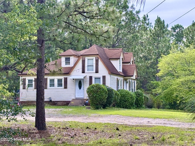 726 Mill Rd, Hamlet, NC 28345 - view of front of property with entry steps, a front yard, and roof with shingles
