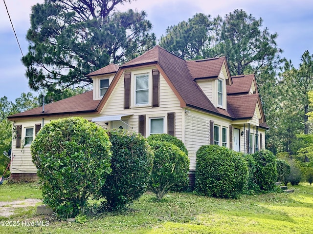 726 Mill Rd, Hamlet, NC 28345 - view of side of property featuring a lawn and a shingled roof