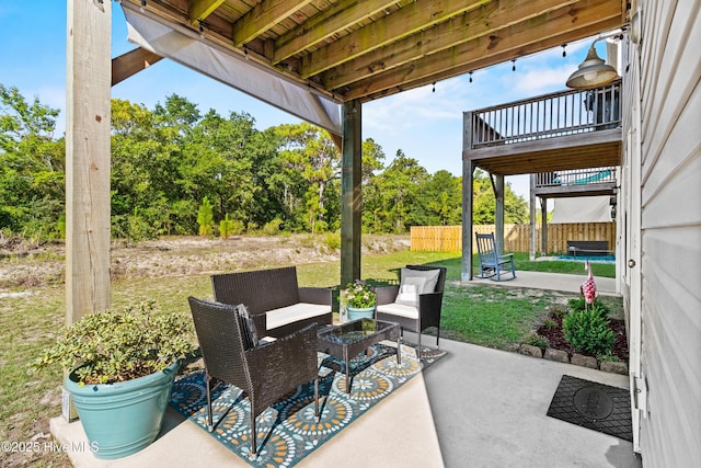 701 Elton Ave Unit 1, Carolina Beach, NC 28428 - view of patio / terrace featuring outdoor lounge area and view of scattered trees