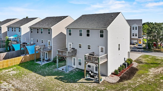 701 Elton Ave Unit 1, Carolina Beach, NC 28428 - back of house with a residential view and a patio
