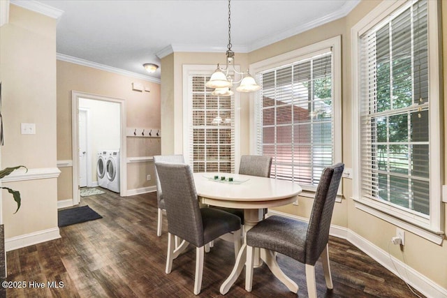 419 Morgan Trace Ln, Goldsboro, NC 27530 - dining room with separate washer and dryer, dark wood-style flooring, ornamental molding, and a chandelier