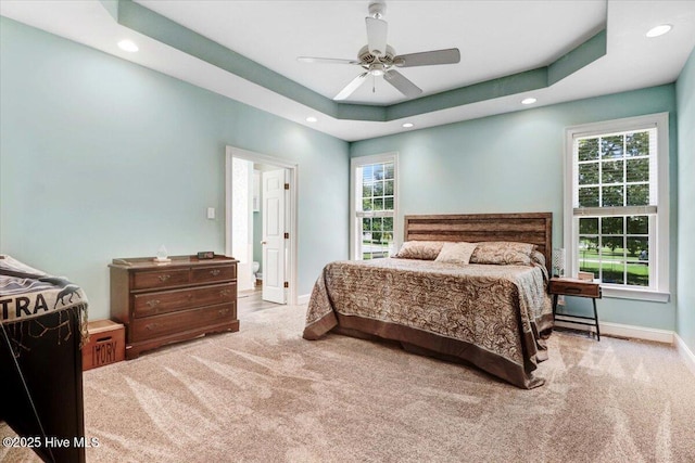 419 Morgan Trace Ln, Goldsboro, NC 27530 - carpeted bedroom with recessed lighting, a ceiling fan, and a tray ceiling