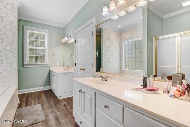 419 Morgan Trace Ln, Goldsboro, NC 27530 - bathroom featuring ornamental molding, wood finished floors, two vanities, a stall shower, and healthy amount of natural light