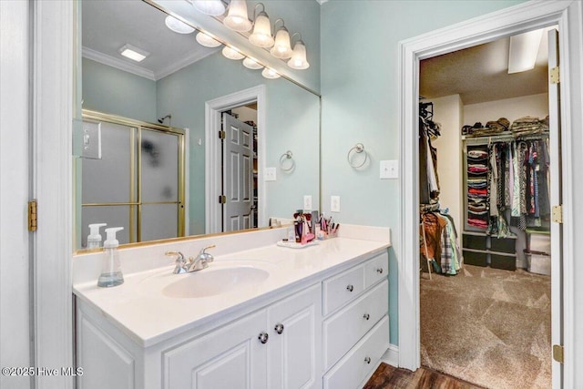419 Morgan Trace Ln, Goldsboro, NC 27530 - full bath with vanity, a shower stall, a spacious closet, and crown molding