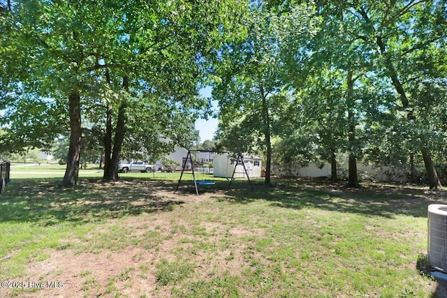 419 Morgan Trace Ln, Goldsboro, NC 27530 - fenced backyard featuring a shed