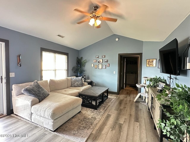 202 Oak Ridge Ln, Holly Ridge, NC 28445 - living area with ceiling fan, lofted ceiling, and light wood finished floors