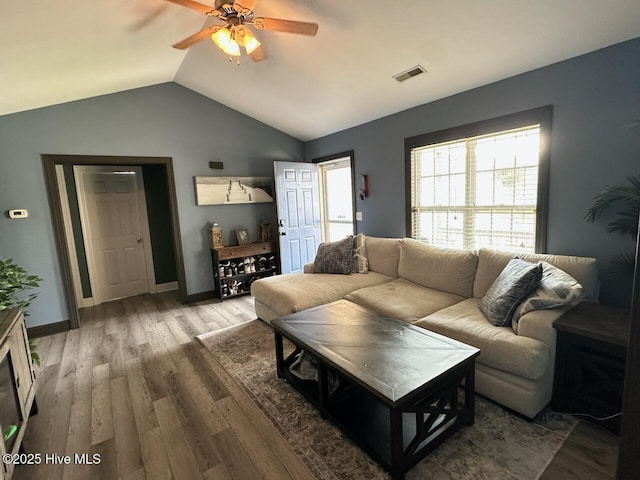 202 Oak Ridge Ln, Holly Ridge, NC 28445 - living room with a ceiling fan, vaulted ceiling, and wood finished floors