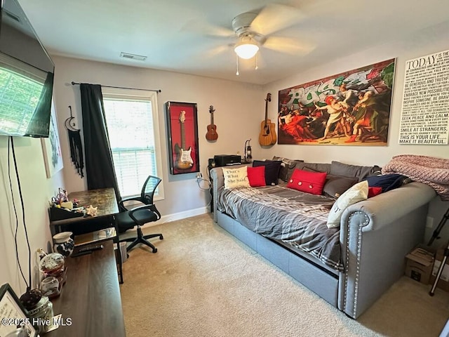 202 Oak Ridge Ln, Holly Ridge, NC 28445 - carpeted bedroom with ceiling fan and baseboards