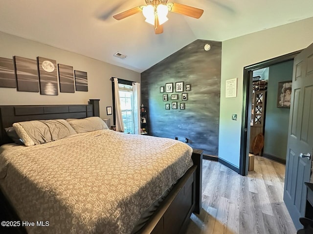 202 Oak Ridge Ln, Holly Ridge, NC 28445 - bedroom with vaulted ceiling, light wood-type flooring, and ceiling fan