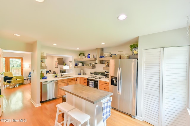 875 Martin Luther King Jr Blvd Apt 7, Chapel Hill, NC 27514 - kitchen featuring stainless steel appliances, open shelves, light brown cabinets, light wood-style floors, and recessed lighting
