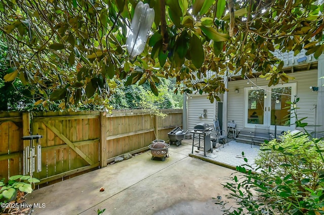875 Martin Luther King Jr Blvd Apt 7, Chapel Hill, NC 27514 - view of patio with a gate, a grill, and french doors